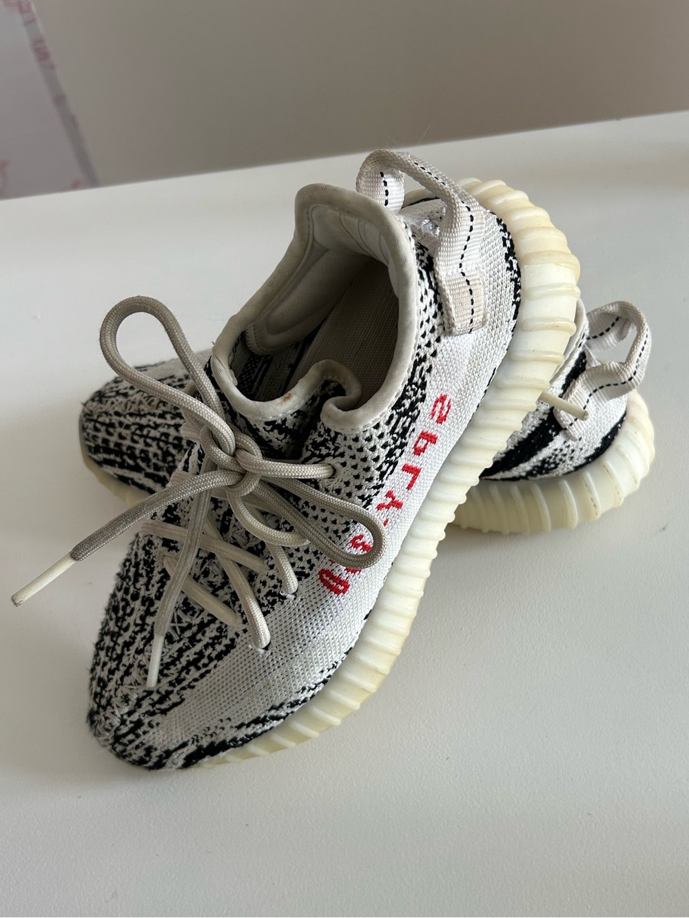 Yeezy Kids Knit Sneakers in Black, White & Red Accent
